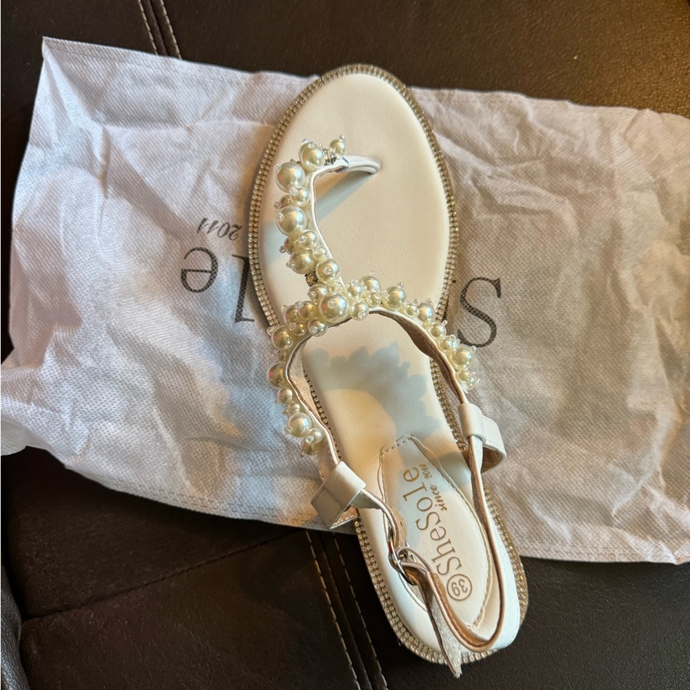 Look******Beautiful used pearl and rhinestone wedding sandals size 8.5.